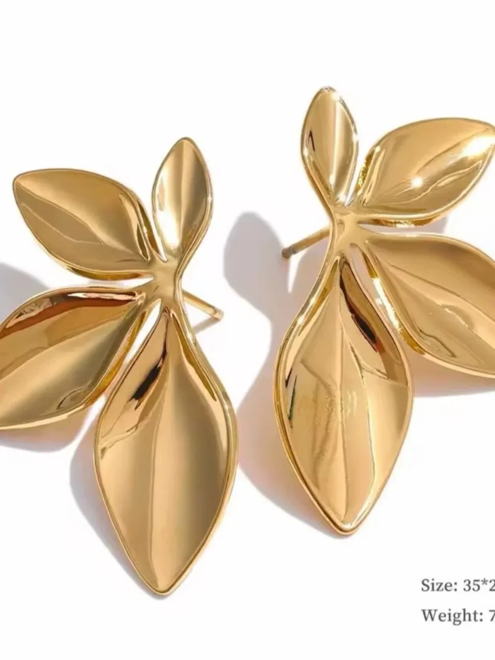 Stainless steel leaves in gold tone stud earrings